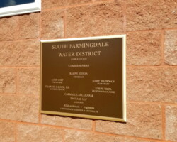 Elegant Cast Bronze Plaque with Flat Band Bevel Border for South Farmingdale Water District