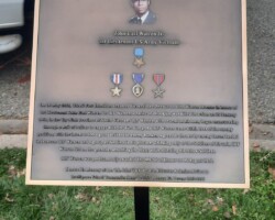 #2 Photo engraved bronze plaque with a flat band border, oxidized background, full color images, post on back for a ground mount.