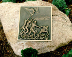 MILITARY PLAQUES & EMBLEMS #23 CAST BRONZE PLAQUE, FLAT BAND BORDER, SCULPTED SCENERY ON THE FACE.