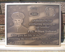 Photo #37 Photo engraved Bronze plaque with a flat band border and oxidized color, Studs on back for mounting.