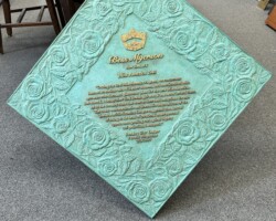 Bronze plaque #27  cast bronze plaque, no border, patina background, bas relief flowers, concealed stud mount.