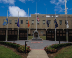 MILITARY PLAQUES & EMBLEMS #52 NASSAU COUNTY PBA MONUMENT. BLACK GRANIT WALLS AND BRONZE PLAQUES