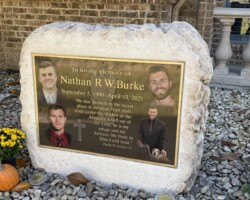 Photo # 18 NATHAN BURKE Photo engraved bronze plaque with full color image, flat band border and oxidized color, Studs on back for mounting.
